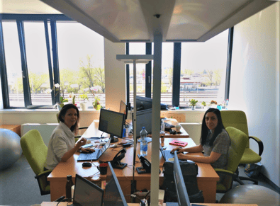Jovana Spasic and Natasa Mitic sitting in their office